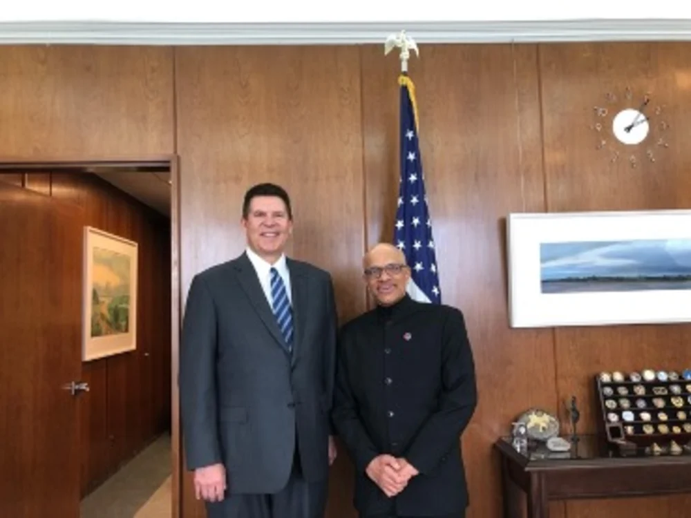 Keith Krach and Opportunity International CEO Atul Tandon